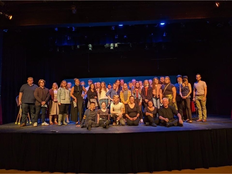 With the cast and crew onstage